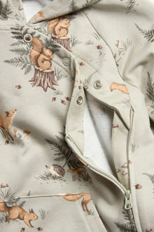 Baby green forest-patterned onesie