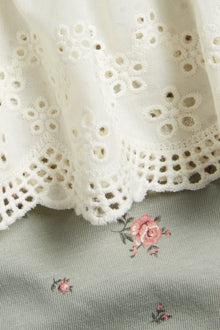 Kids' green floral top with frill