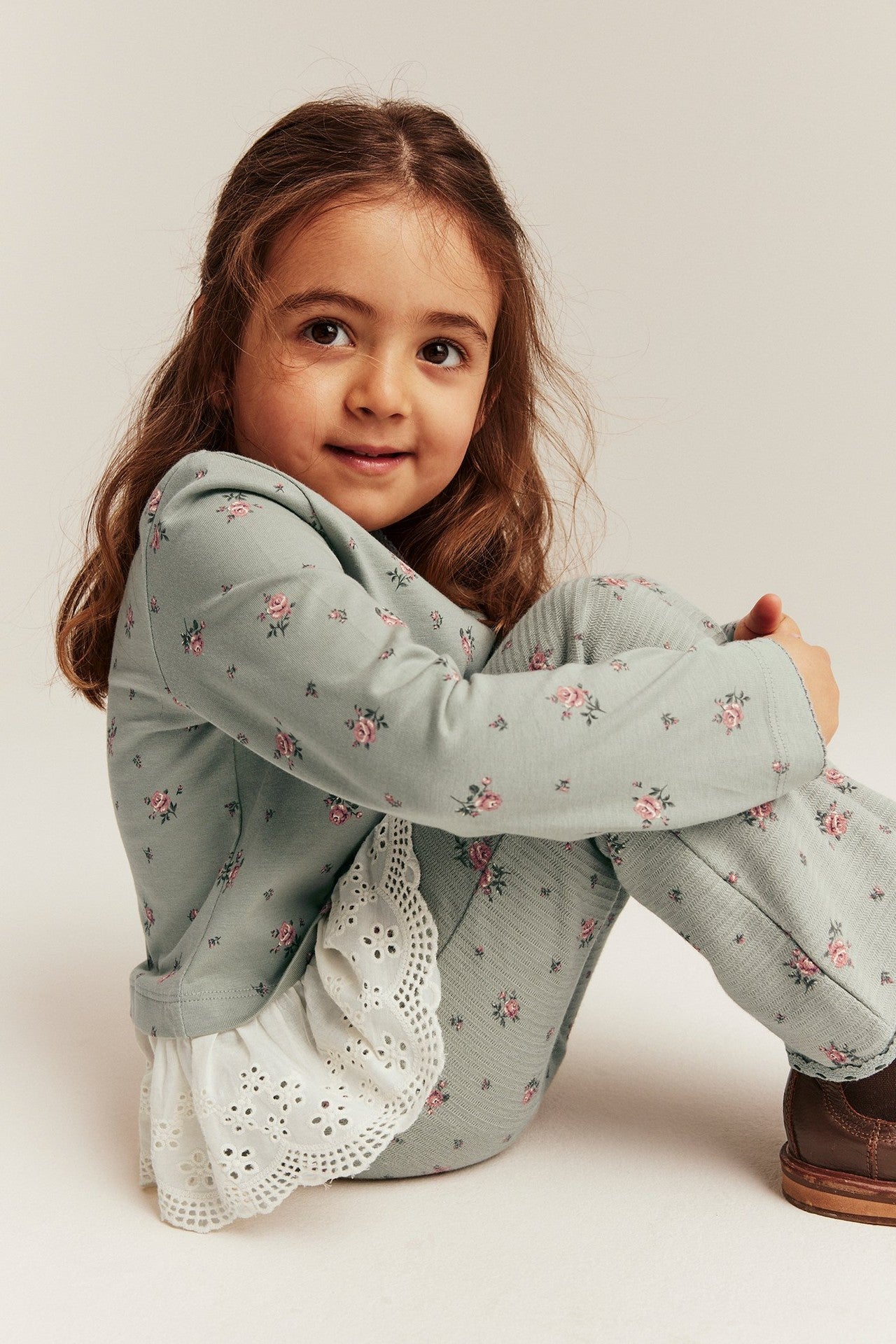 Kids' green floral top with frill