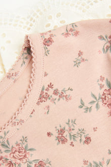 Kids' pink floral top with frill