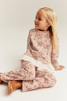 Kids' pink floral top with frill