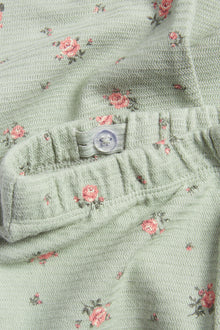 Kids' green flared leggings