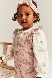 Baby pink floral frill dungarees