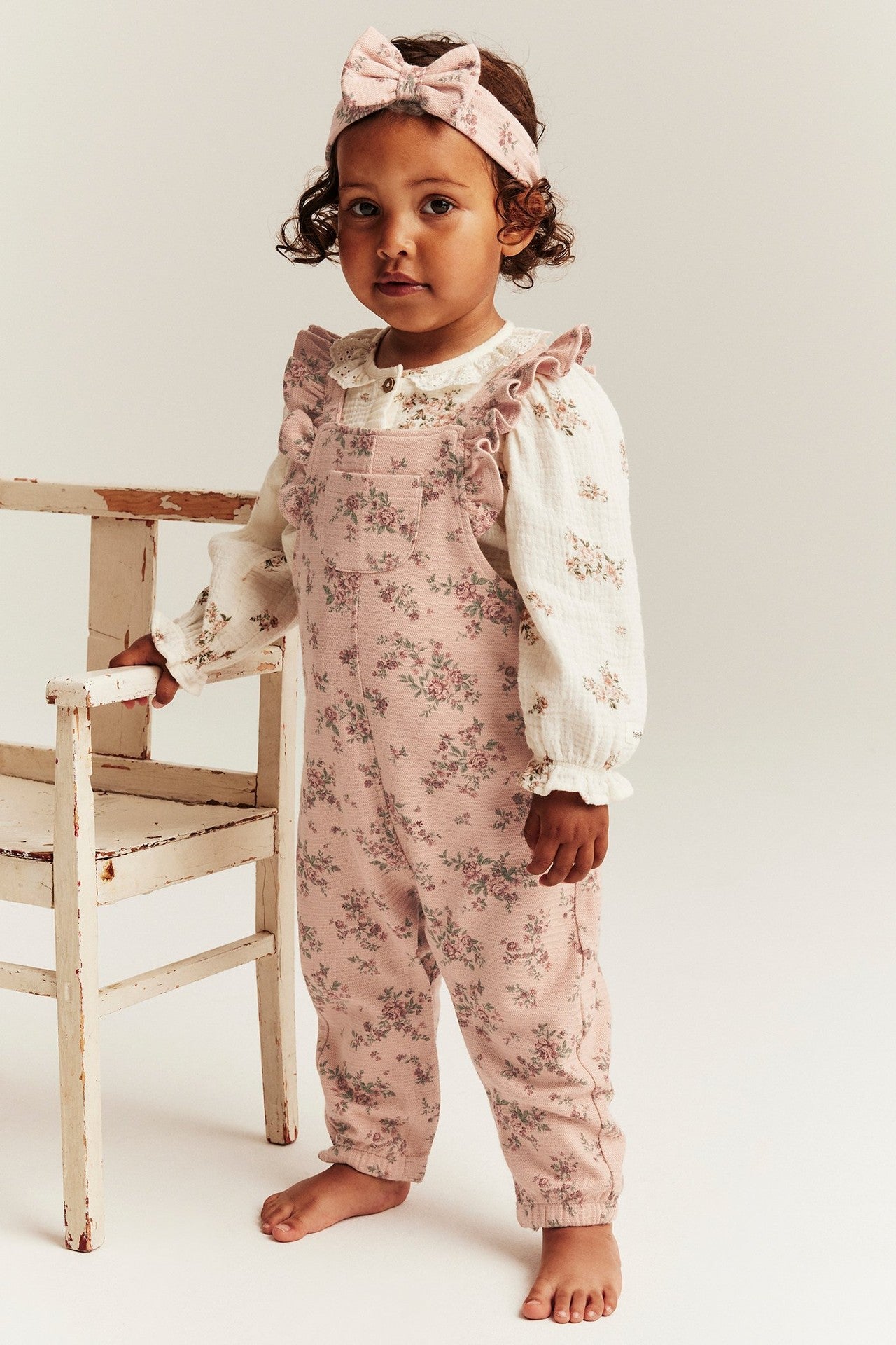 Baby pink floral frill dungarees