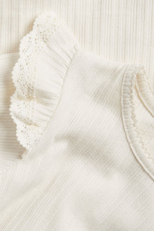 Baby white bodysuit with ruffles