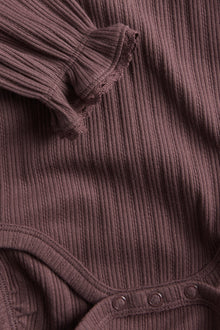 Baby lilac ribbed bodysuit with lace trim