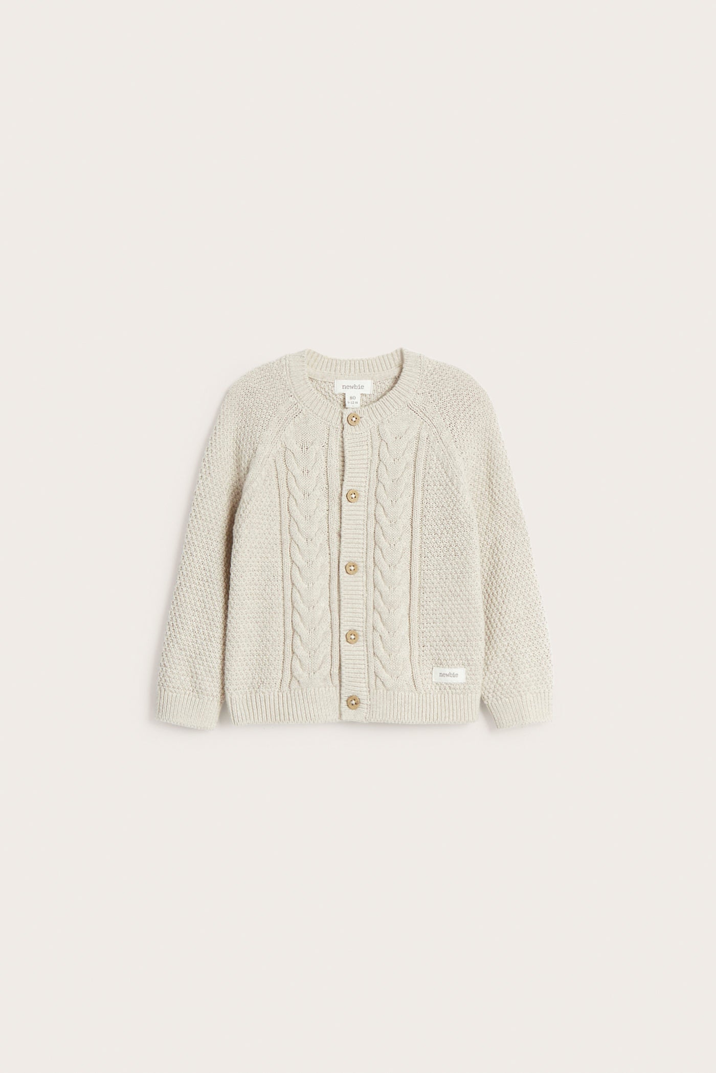 Baby beige knitted cardigan