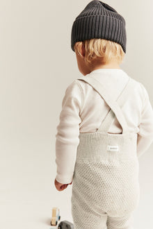 Baby beige knitted dungarees