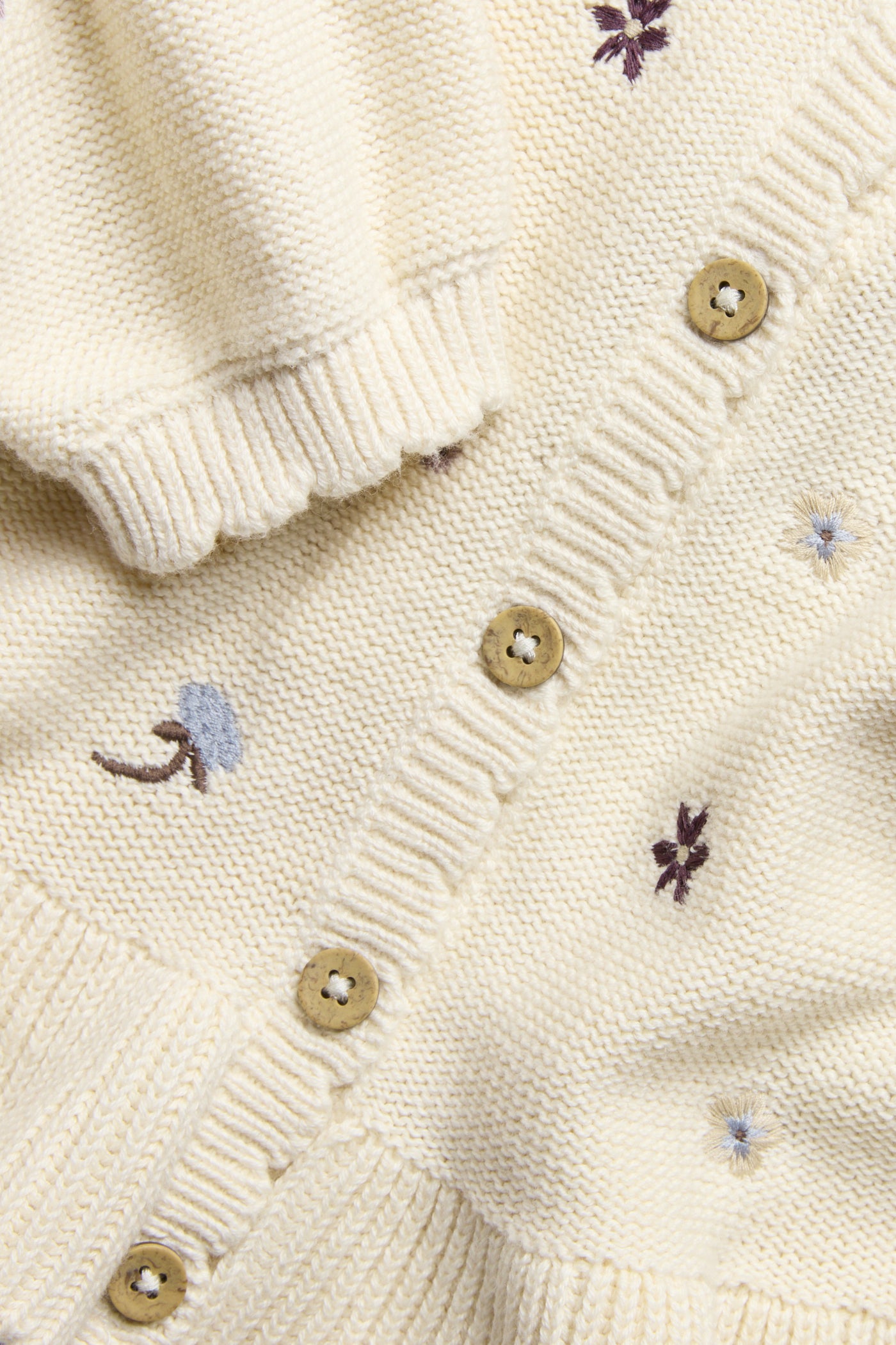 Baby beige knitted floral cardigan