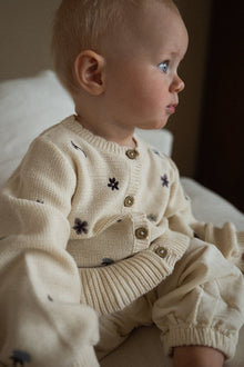 Baby beige knitted floral cardigan