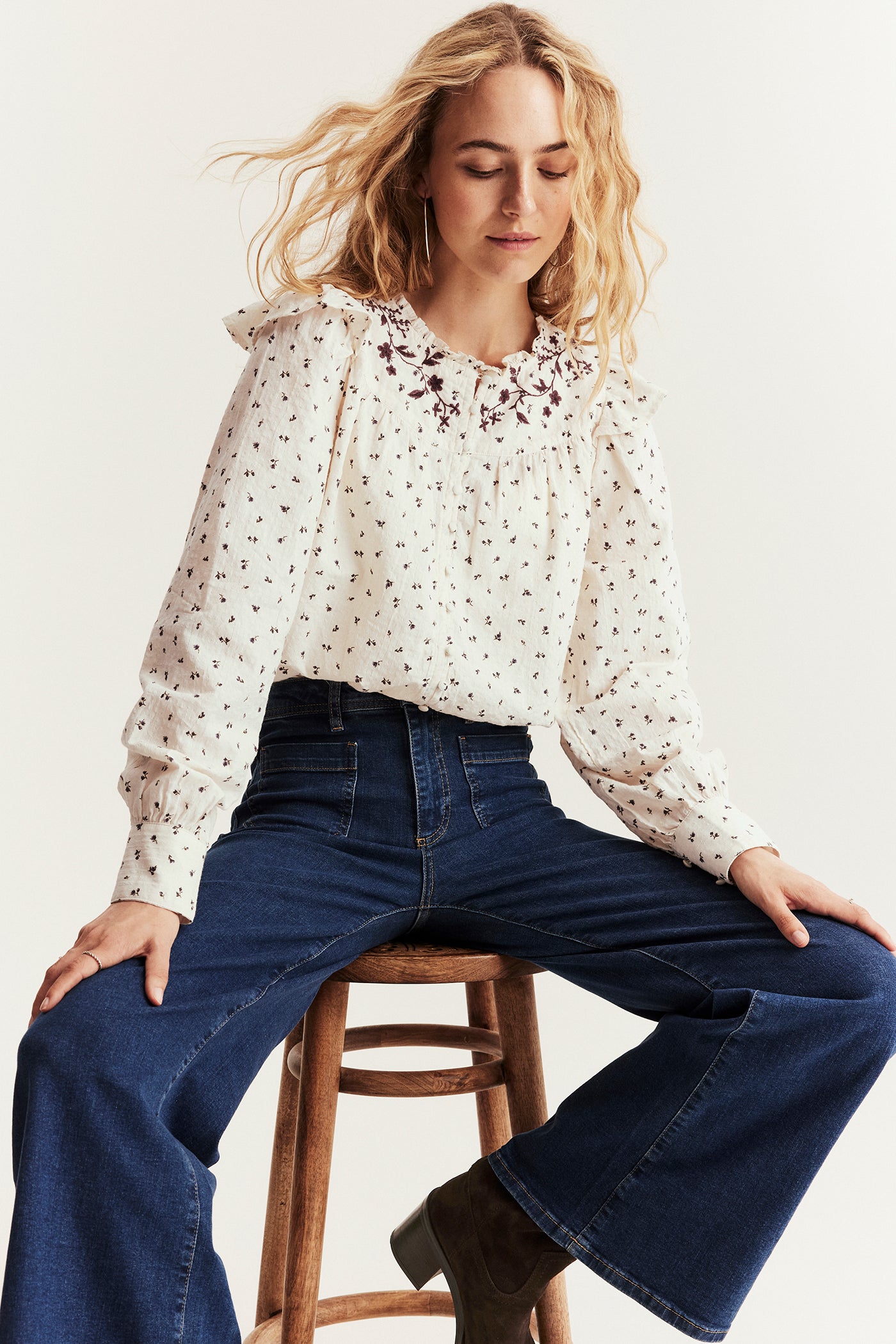 Women's beige floral blouse with frill