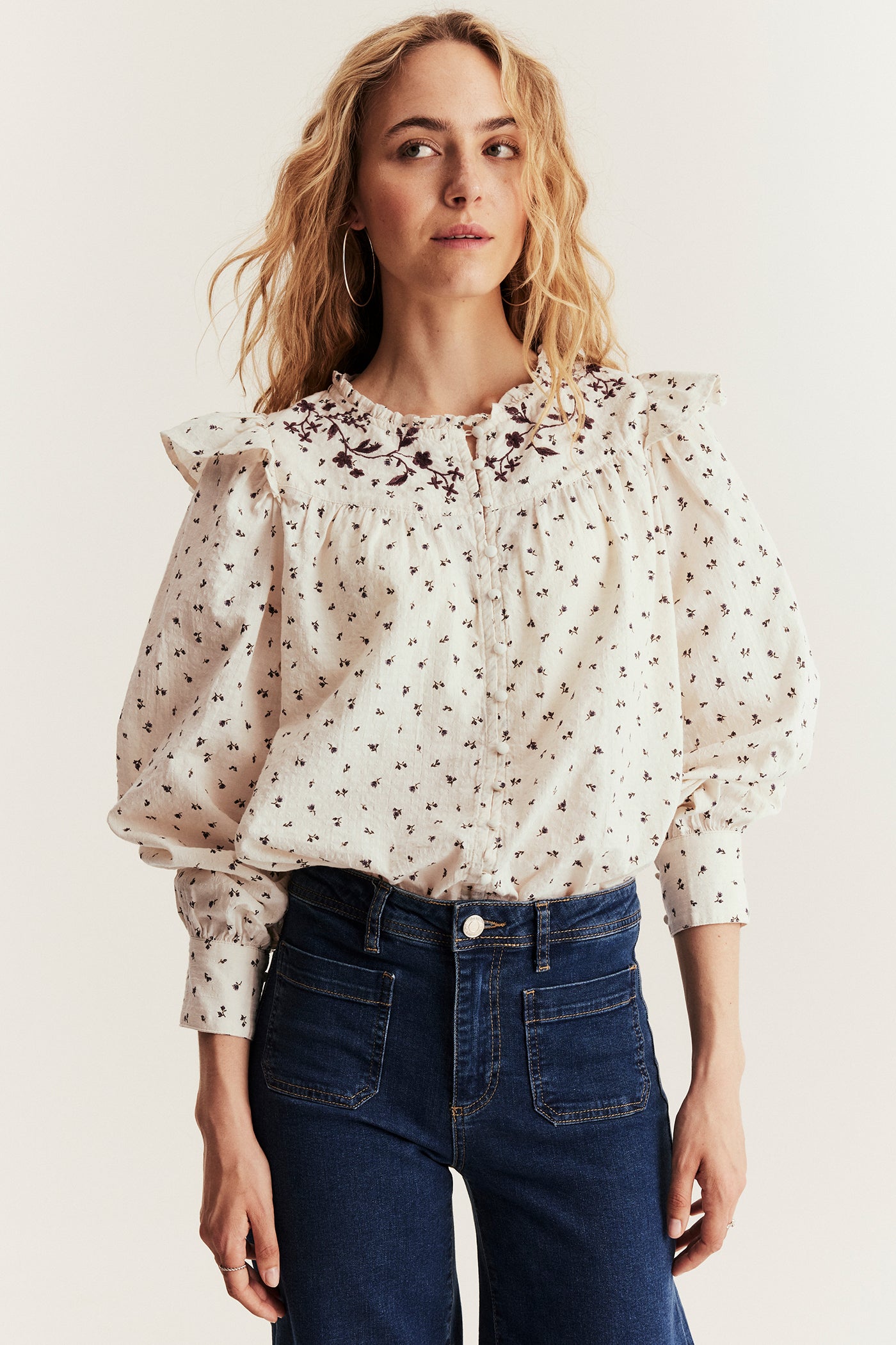 Women's beige floral blouse with frill