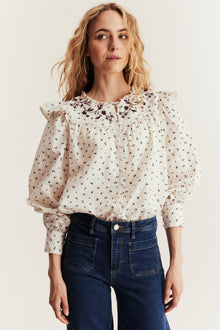 Women's beige floral blouse with frill