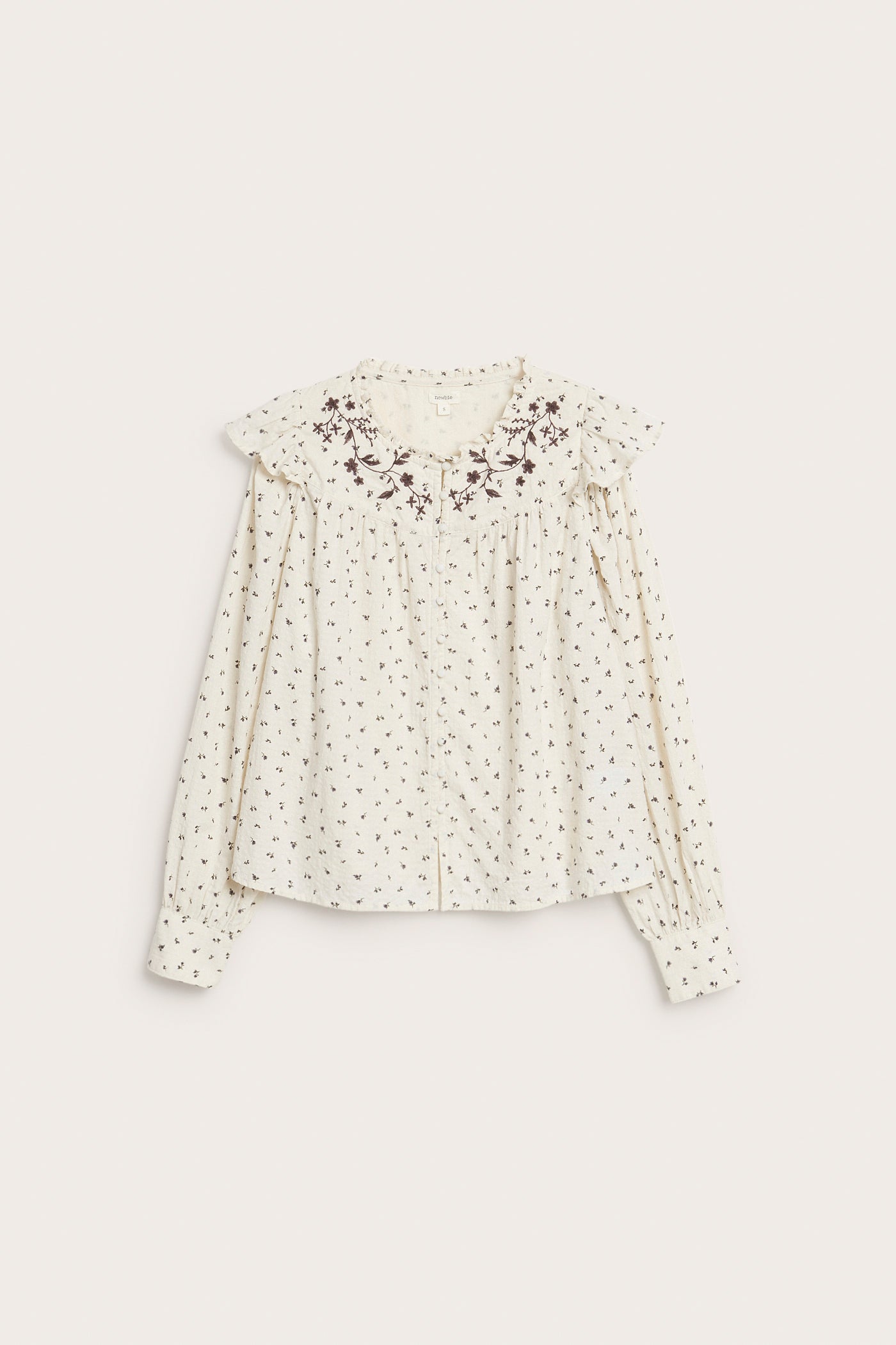 Women's beige floral blouse with frill