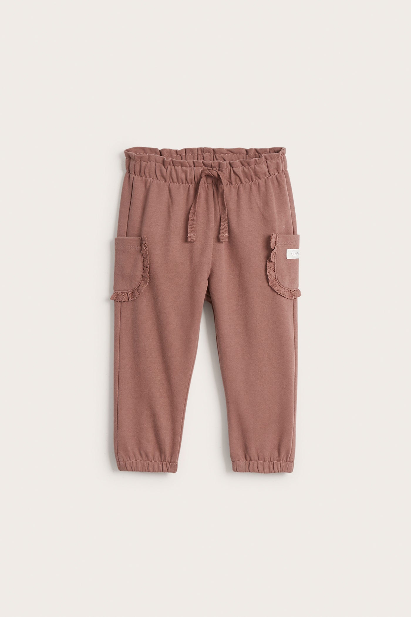 Baby pink joggers with laced pockets