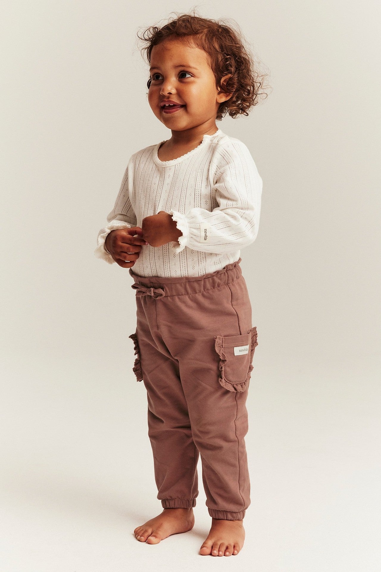 Baby pink joggers with laced pockets