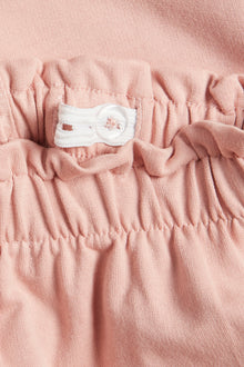 Kids' light pink jogger trousers