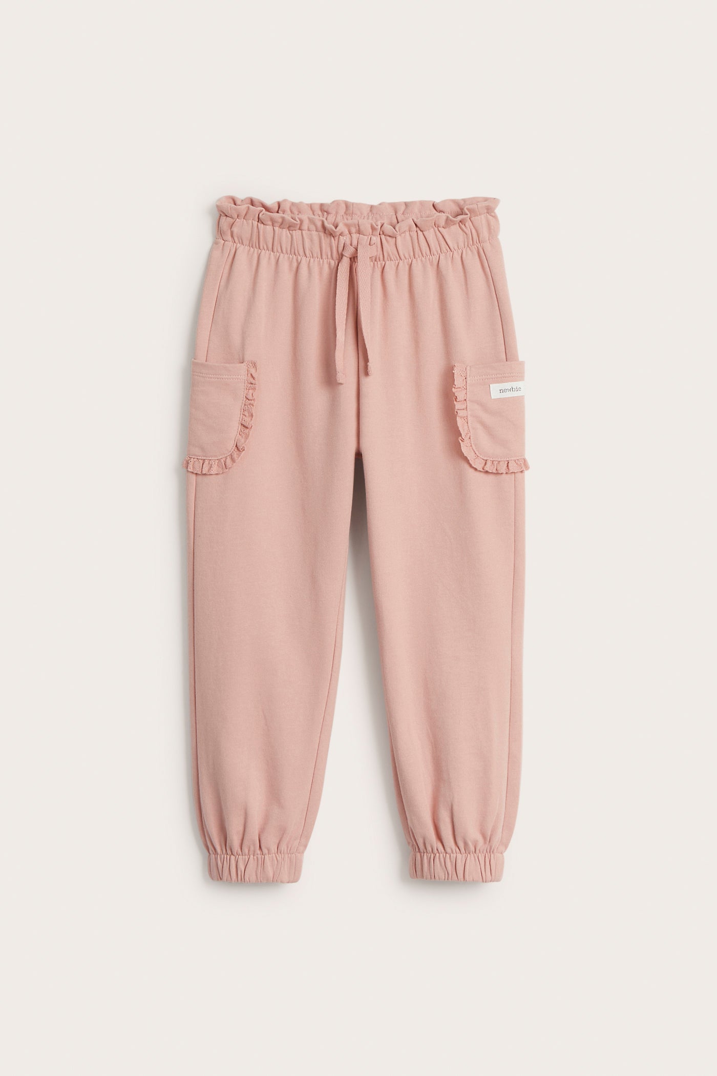 Kids' light pink jogger trousers