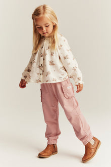 Kids' light pink jogger trousers