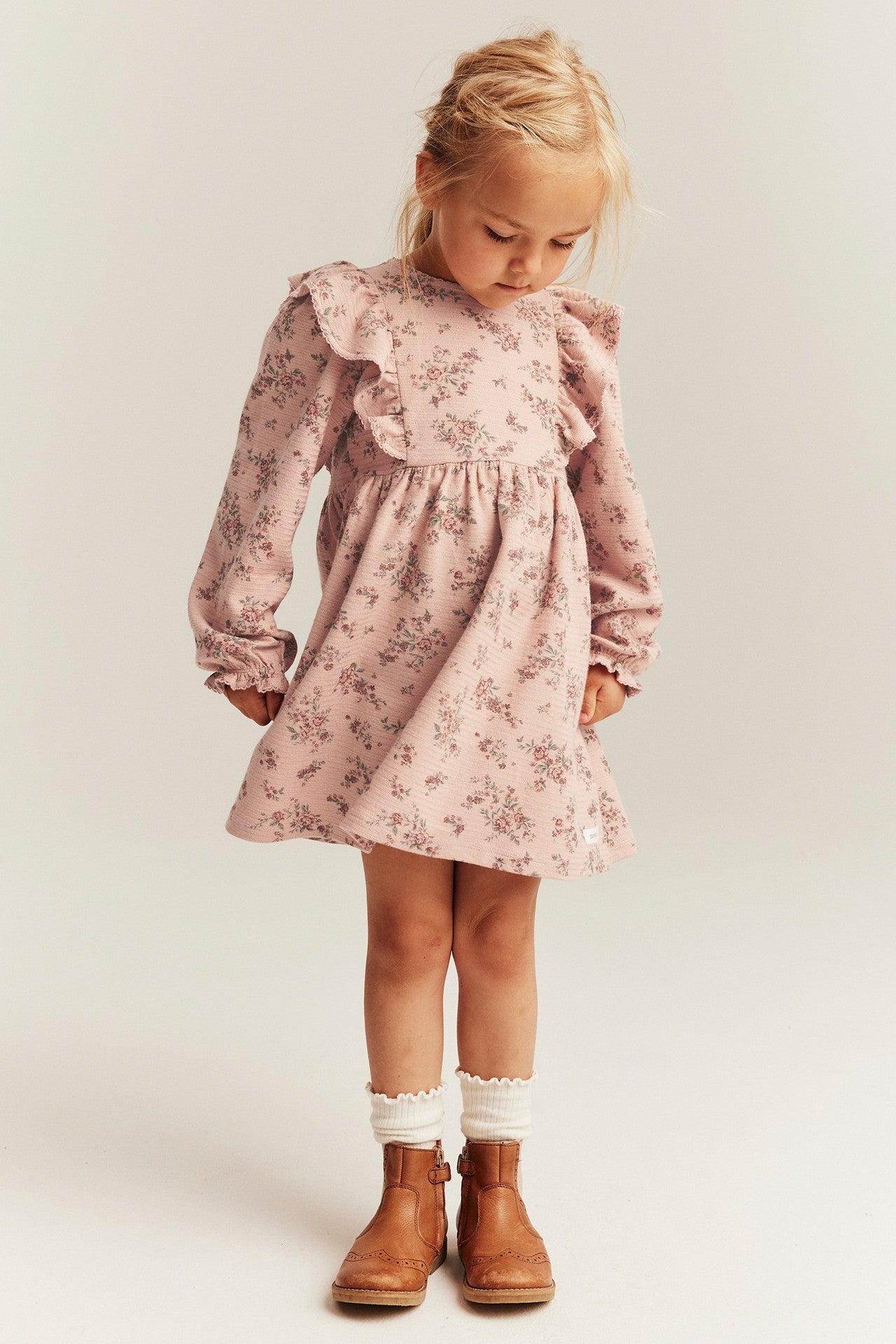 Kids' pink floral dress with frills