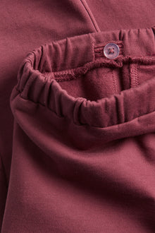 Kids red jogging trousers