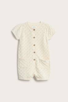 Baby beige knitted romper