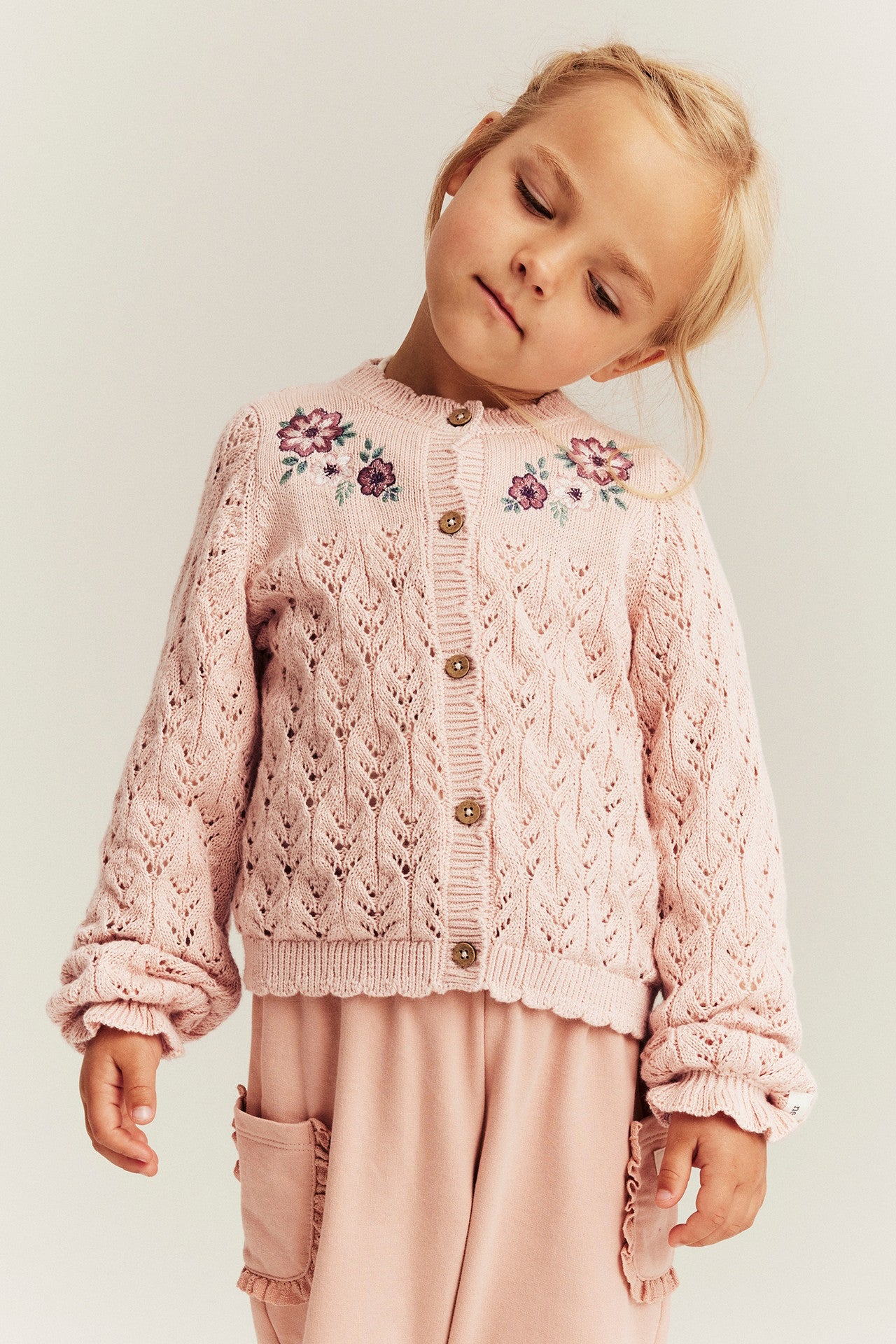 Kids' pink knitted cardigan