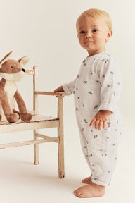 Baby beige onesie with acorns
