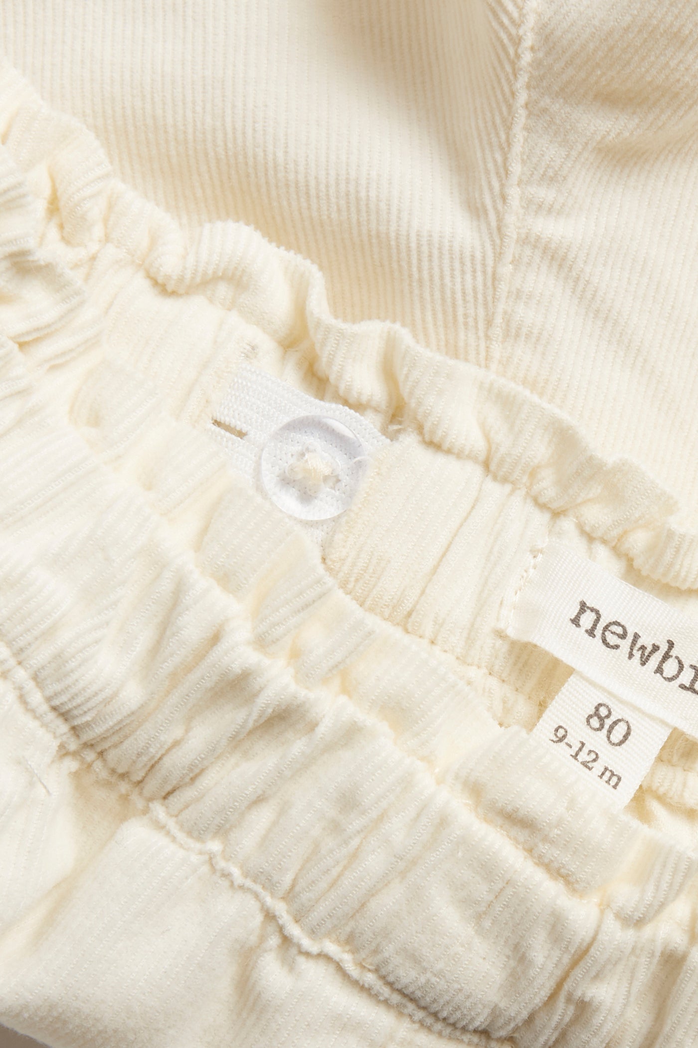 Baby beige corduroy trousers