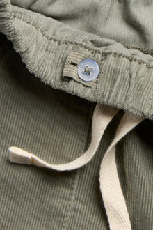 Kids green corduroy trousers