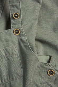 Baby green dungarees