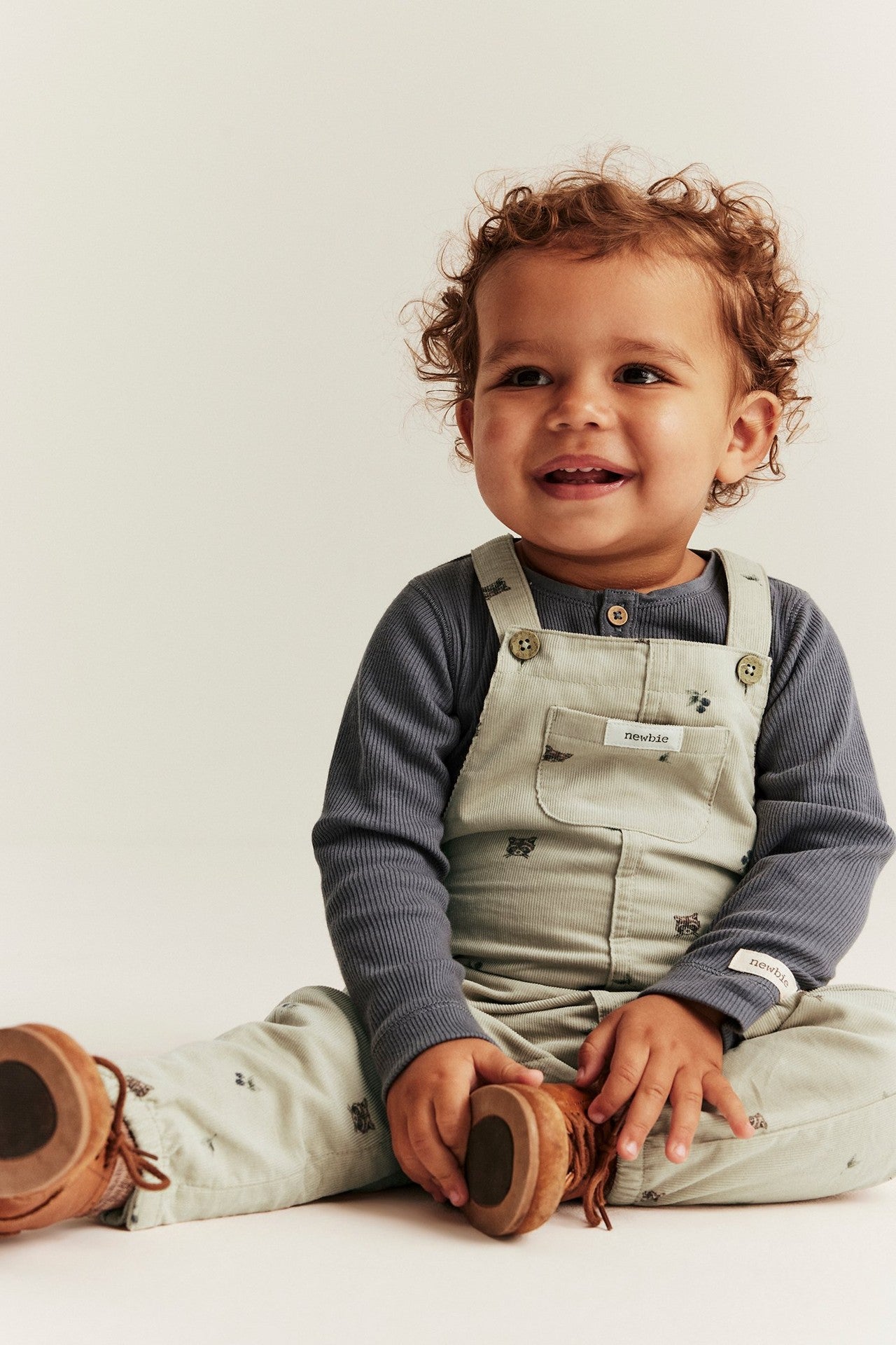 Baby beige corduroy forest dungarees