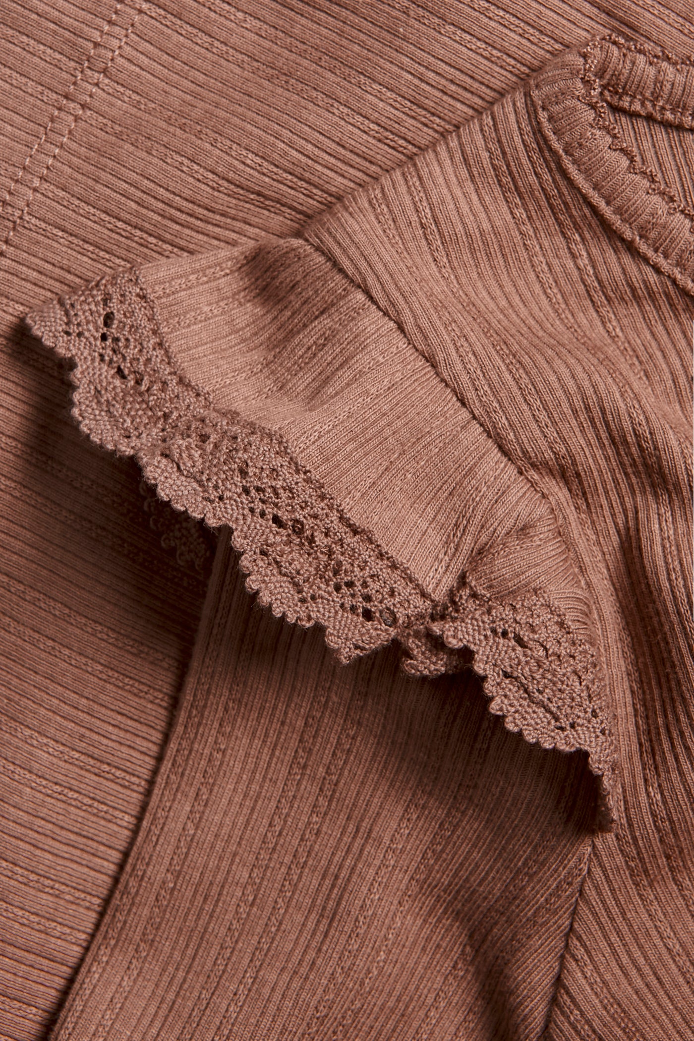 Kids' pink ribbed top with frills