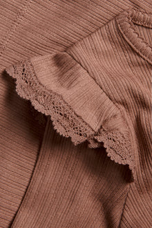 Kids' pink ribbed top with frills