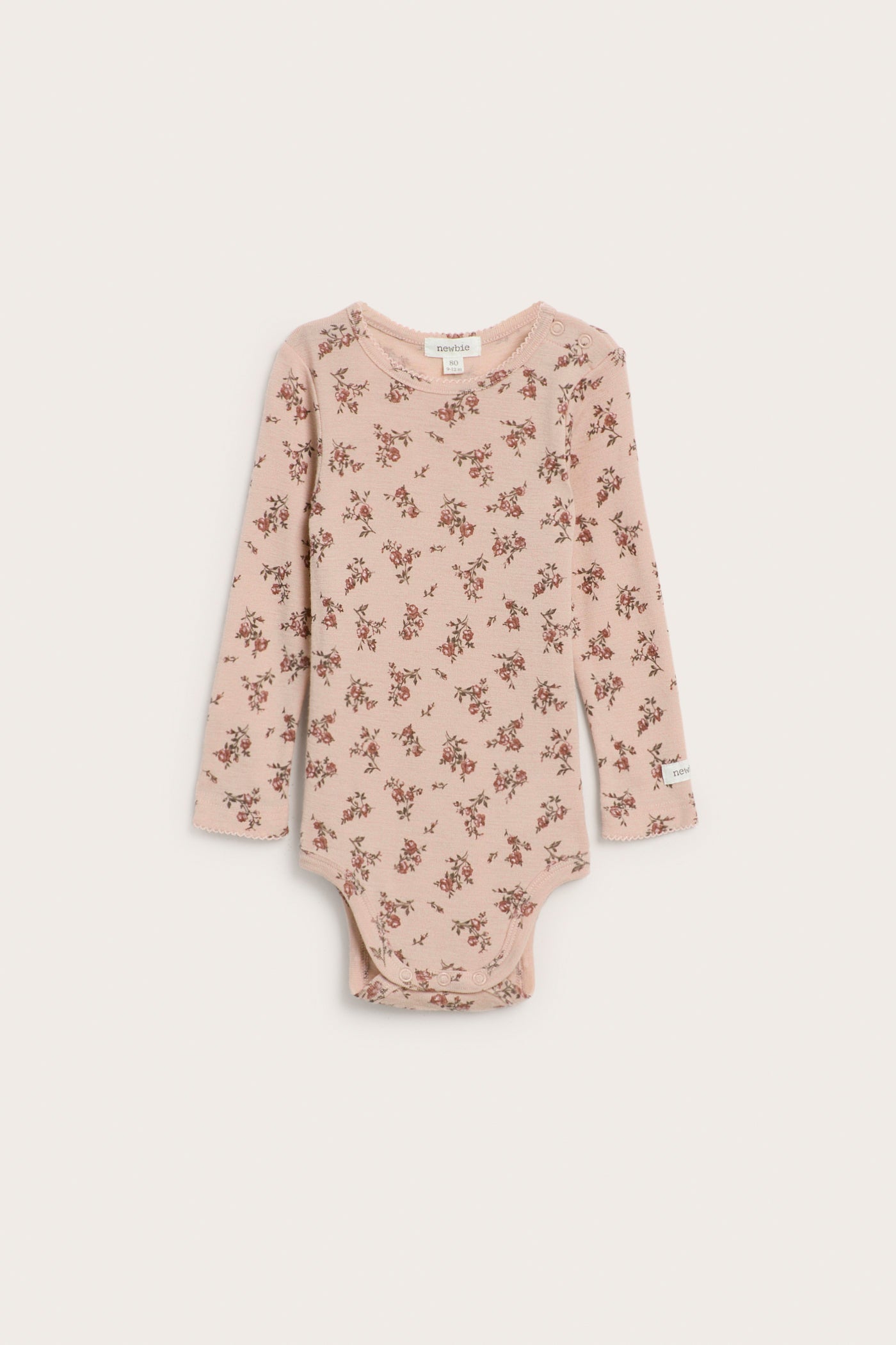 Baby pink floral merino wool bodysuit