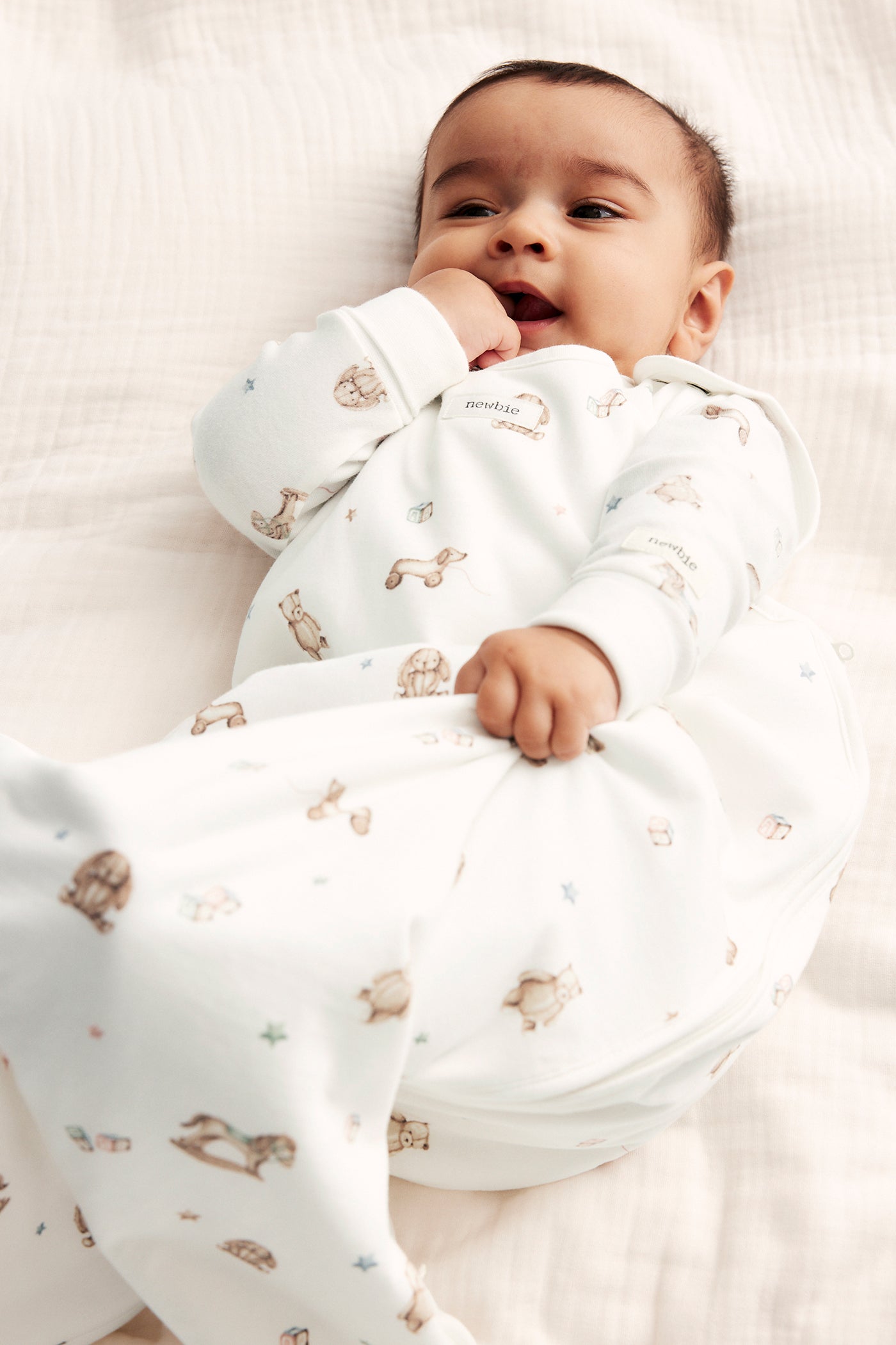 Baby white toy patterned sleeping bag