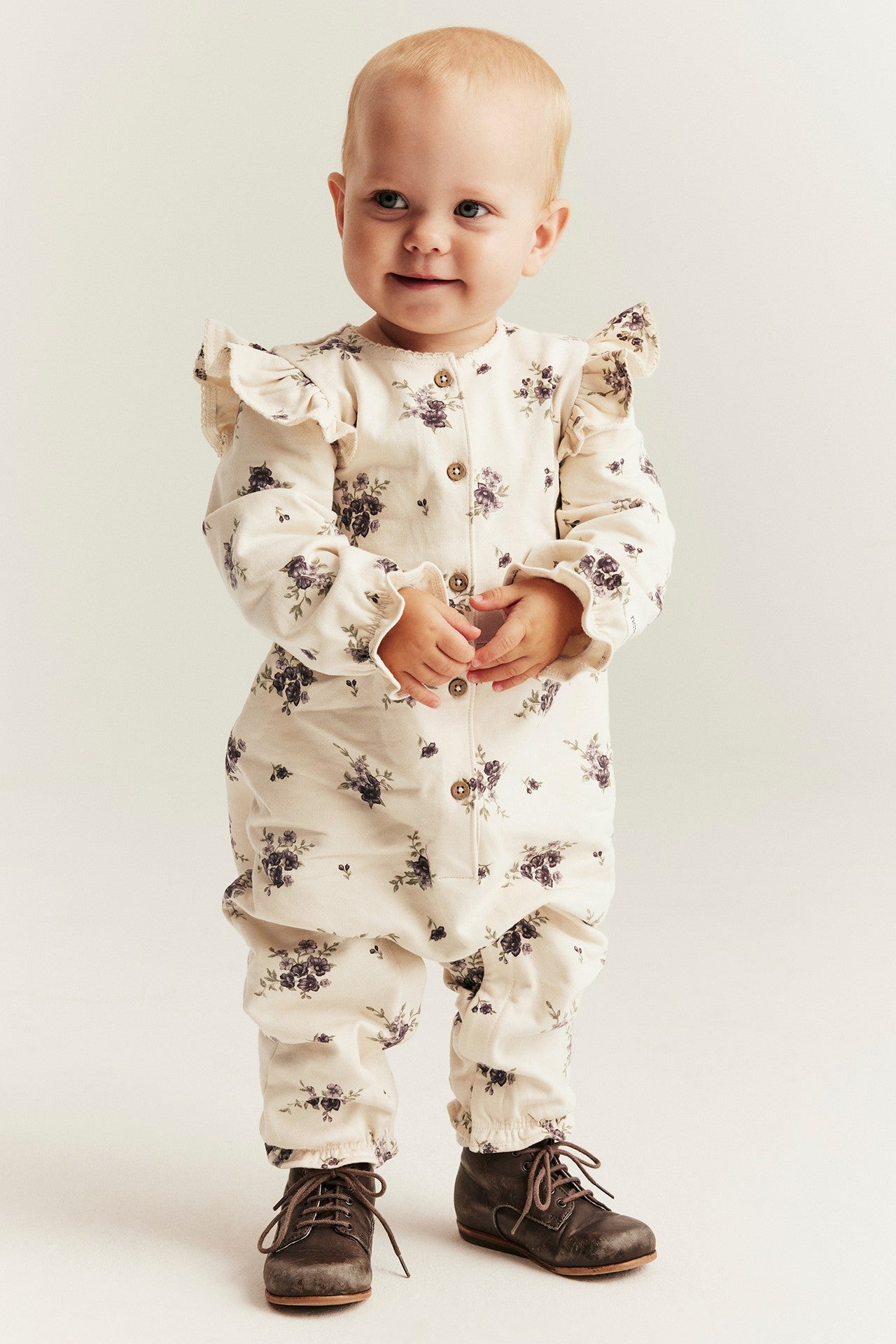 Baby beige floral jumpsuit with frills