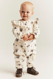 Baby beige floral jumpsuit with frills