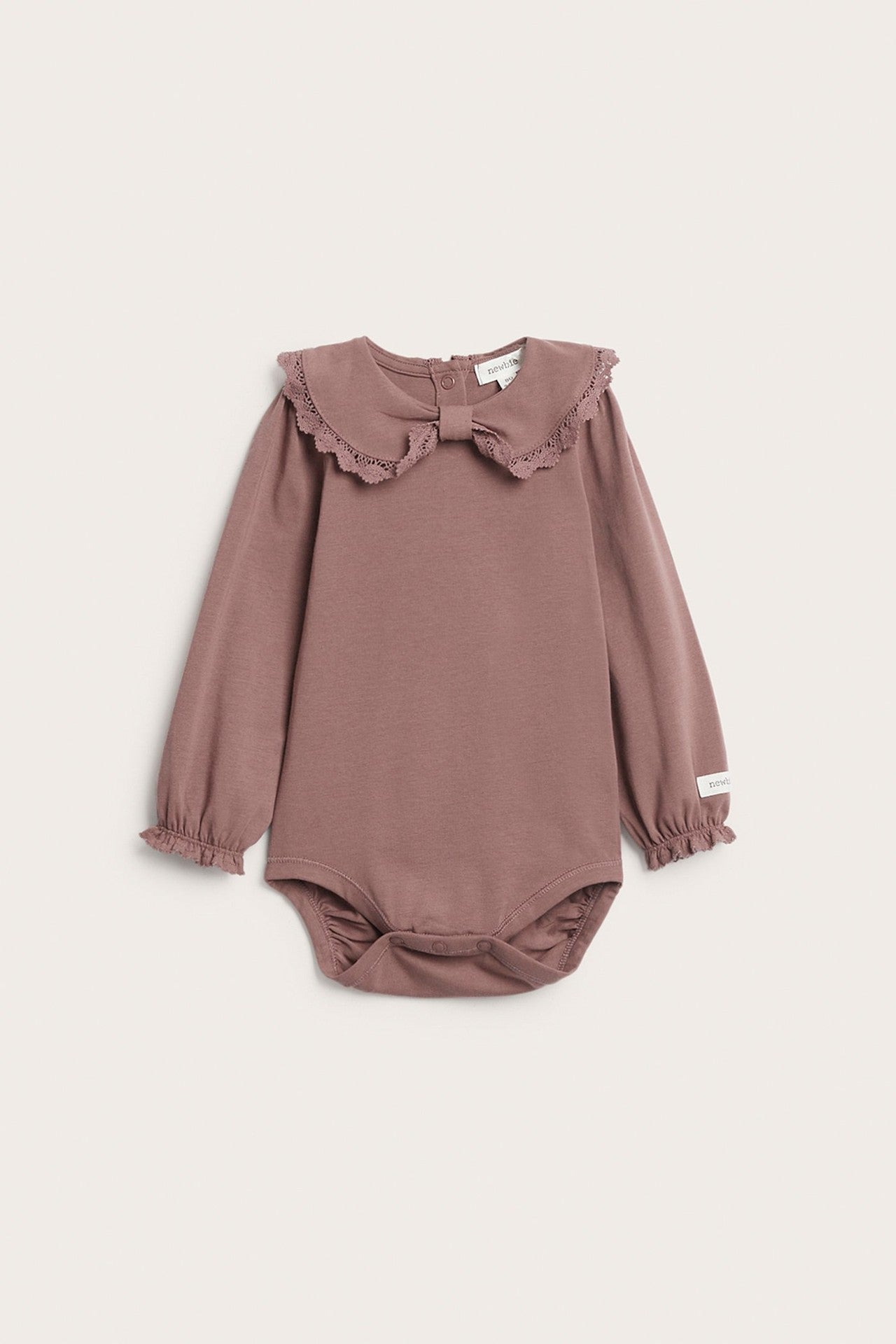 Baby pink bodysuit with bow collar