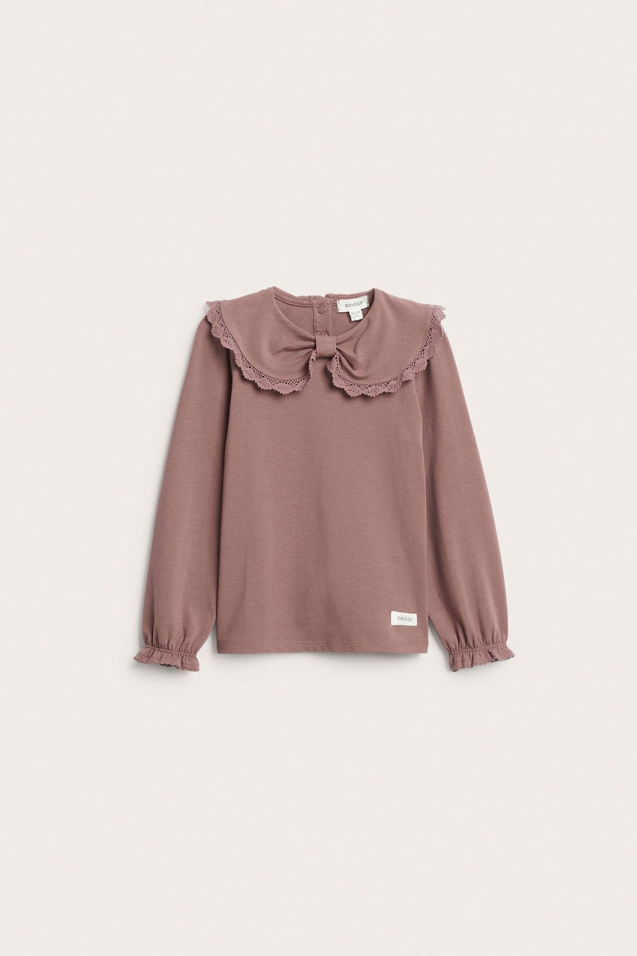 Kids' pink top with bow collar