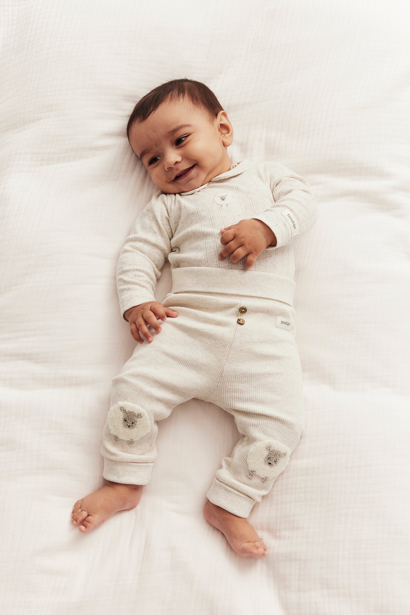 Baby white bodysuit with lamb
