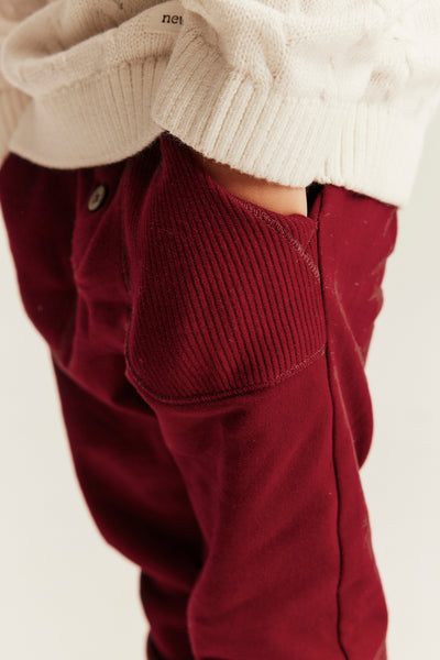 Kids´ red jogging trousers