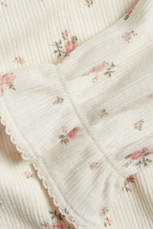 Kids' white top with flowers