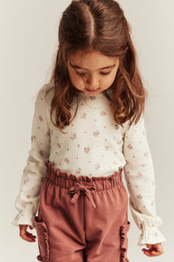 Kids' white top with flowers