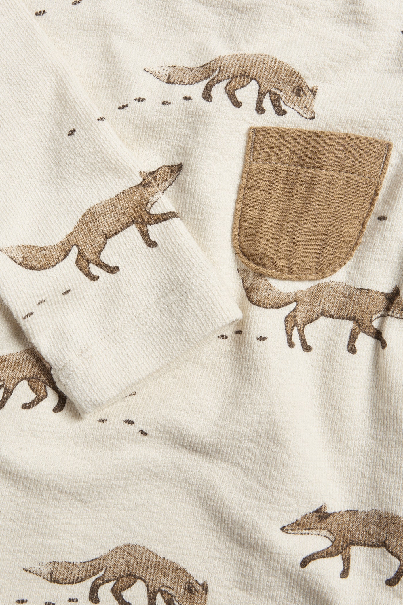 Baby beige bodysuit with foxes