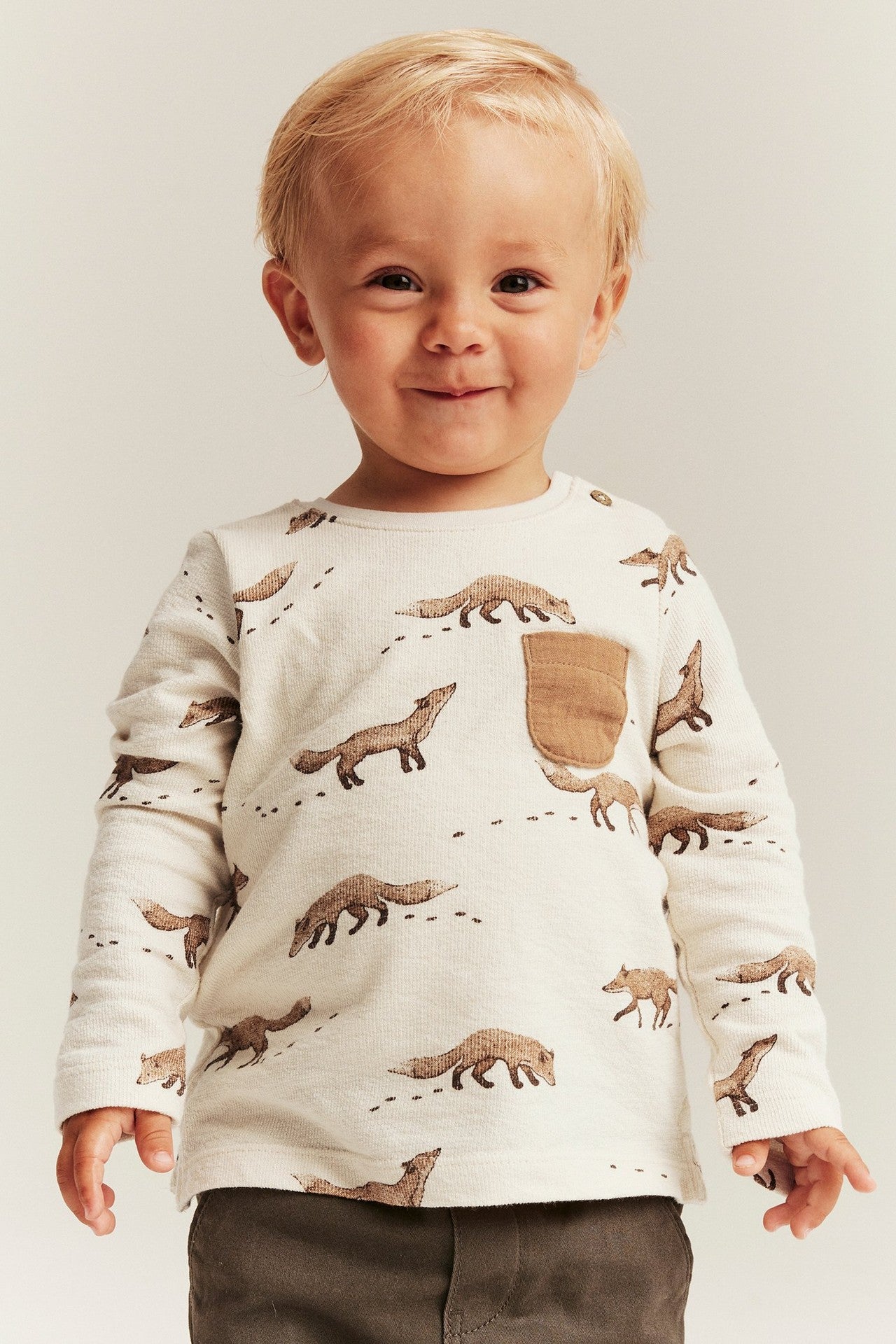 Baby beige bodysuit with foxes