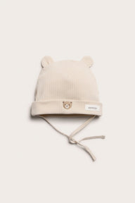 Baby beige ribbed hat with a bear