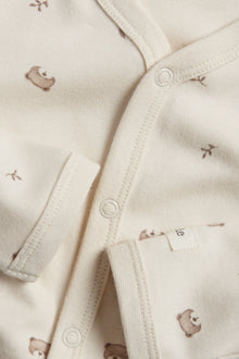 Baby beige sleepsuit with teddy bears