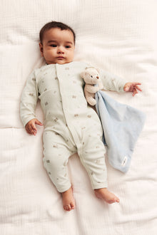 Baby beige sleepsuit with teddy bears