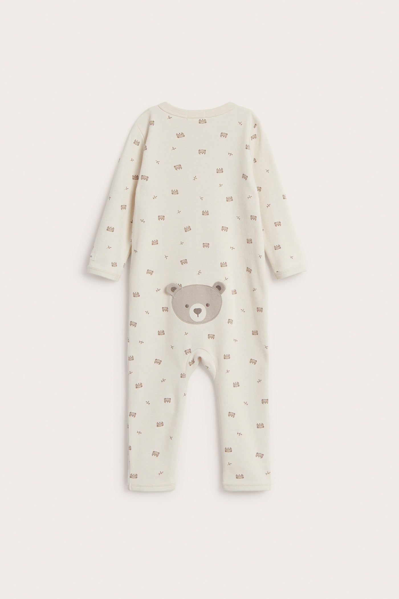 Baby beige sleepsuit with teddy bears